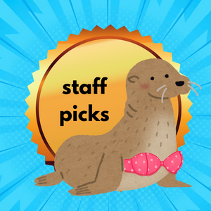 A seal wearing a pink strapless bra poses proudly in front of a gold sticker that reads "staff picks". The seal looks very fetching against a bright blue background.